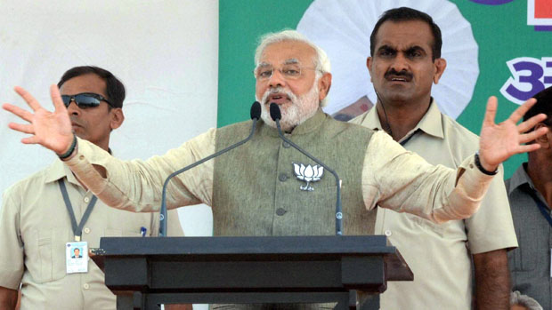 BJP Prime Ministrial candidate Narendra Modi addressing at an election campaign rally in Gopiganj, Bhadohi district in Uttar Pradesh (Photo: PTI) BJP Prime Ministrial candidate Narendra Modi addressing at an election campaign rally in Gopiganj, Bhadohi district in Uttar Pradesh (Photo: PTI)
